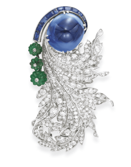 Sugarloaf cabochon sapphire, carved emerald and diamond brooch, ca.1937.