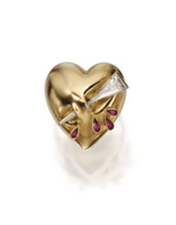 A puffy heart gold ring with rubies and diamonds, attributed to Paul Flato, ca.1940.